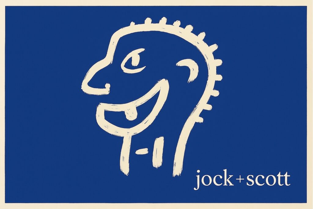 DE: Logo von jock+scott: Stilisierter, lachender Kopf mit Pinselstrich-Optik auf marineblauem Grund. EN: jock+scott logo: Stylized, smiling head with a brushstroke aesthetic on a navy blue background.